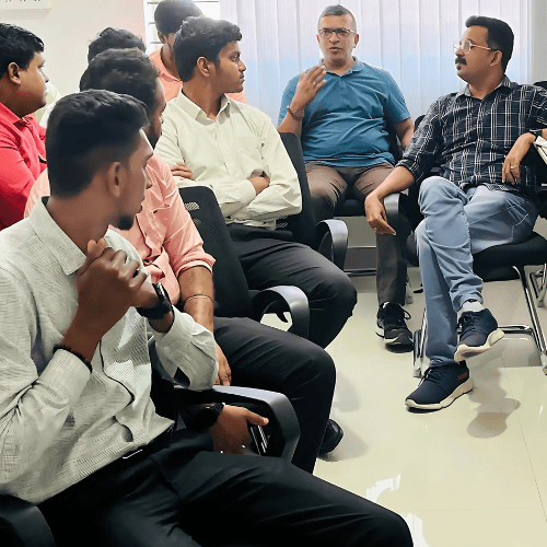 Tekvocation employees participating in the Communication Calibrate program focused on workplace communication and professional etiquette.